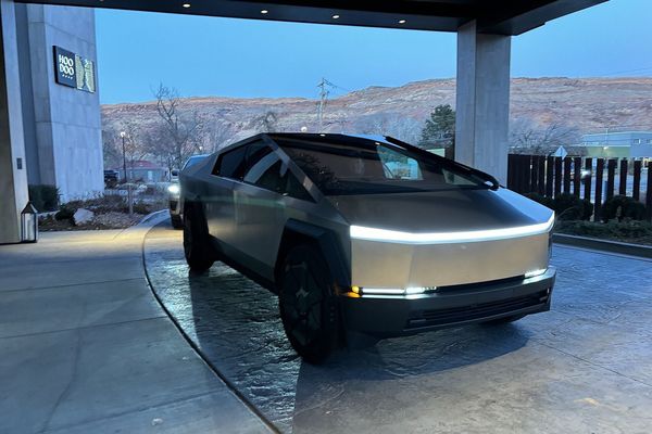 Tesla Cybertruck parked at dusk
